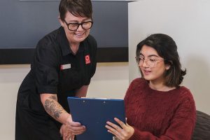 Receptionist at Sunshine Coast Radiology answering a patients frequently asked questions