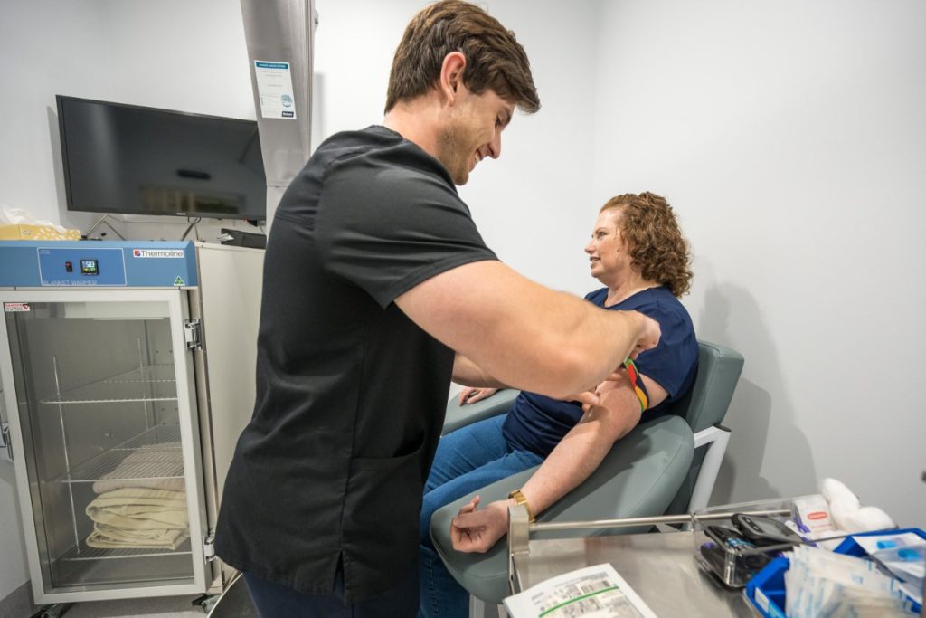 Sunshine Coast Radiology NMT prepares cannula for PET CT scan
