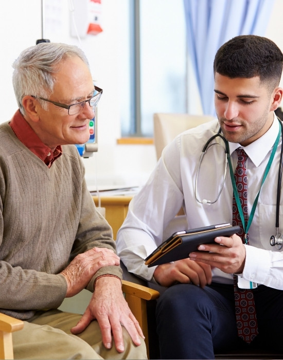 Patient with pacemaker speaks to his doctor about MRI scan